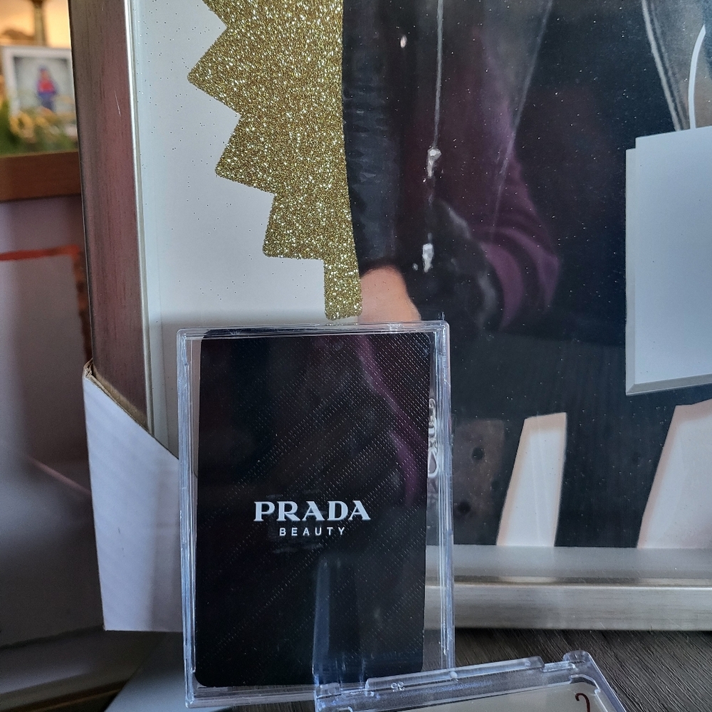 Prada player's card